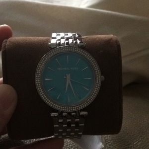 Brand new authentic Michael Kors silver watch.